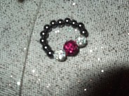Bague 2 boules blanches et une rose