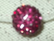Collier boule fushia