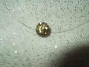Collier boule dorée