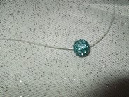 Collier boule bleu turquoise