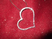 Collier coeur reflets roses