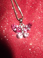 Collier papillon rose